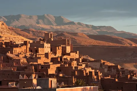 "Guided tour through Morocco's vibrant cities, including Marrakech, Casablanca, Fes, Tangier, and Agadir, exploring the Sahara Desert, Atlas Mountains, and UNESCO World Heritage sites."